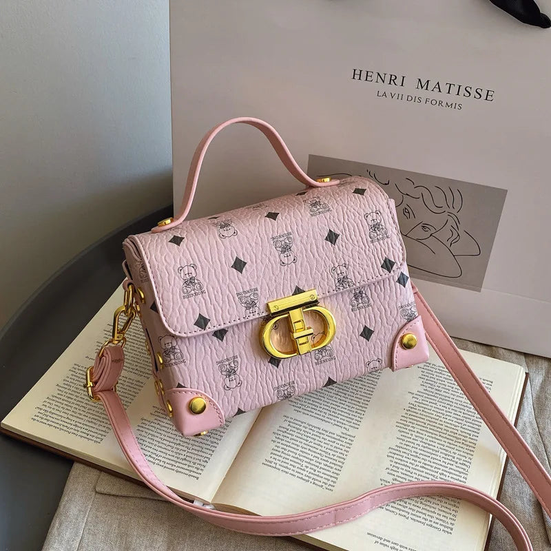 Bolsa quadrada pequena de alta qualidade, uma bolsa versátil de ombro único, uma bolsa crossbody, uma bolsa de caixa versátil para mulheres