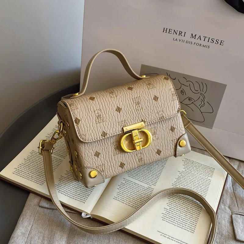 Bolsa quadrada pequena de alta qualidade, uma bolsa versátil de ombro único, uma bolsa crossbody, uma bolsa de caixa versátil para mulheres