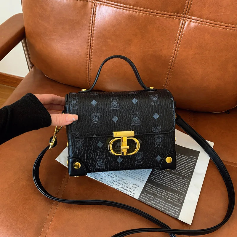 Bolsa quadrada pequena de alta qualidade, uma bolsa versátil de ombro único, uma bolsa crossbody, uma bolsa de caixa versátil para mulheres